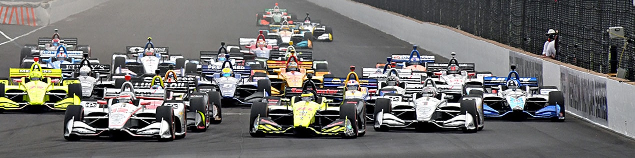 indy cars racing to through the start line Jackson