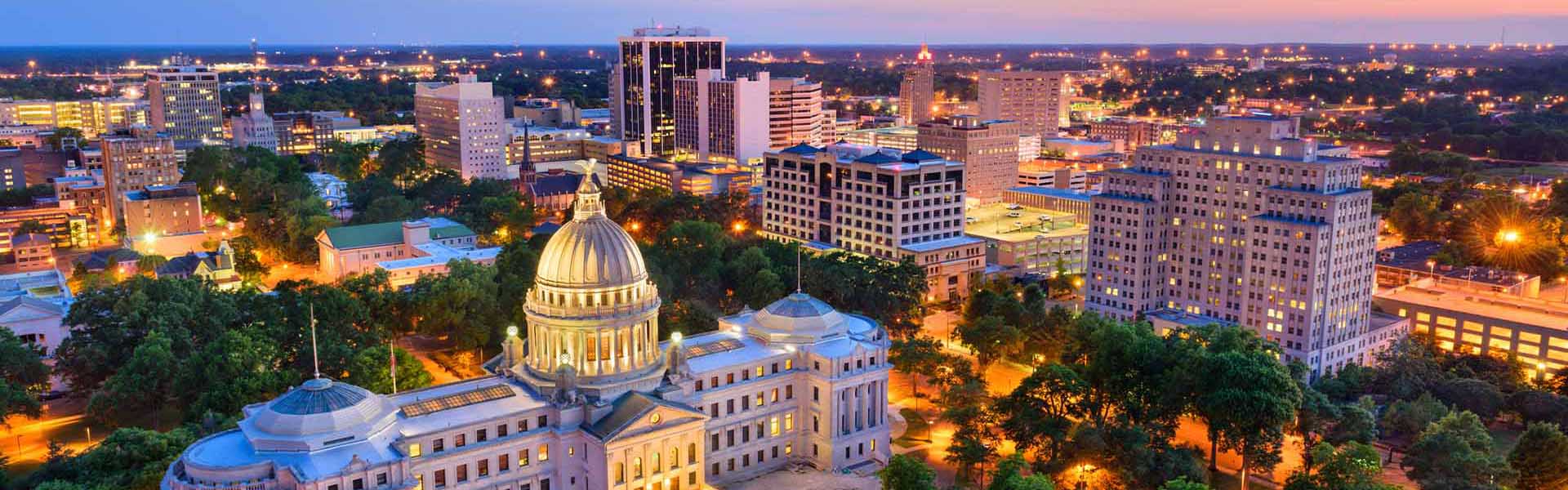 Neon color image of a band playing and people singing along